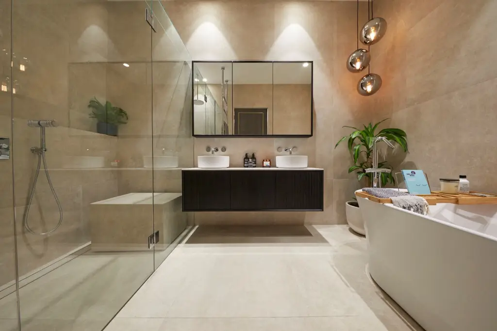 Custom shower screen installed in a bathroom styled to feel like a spa retreat